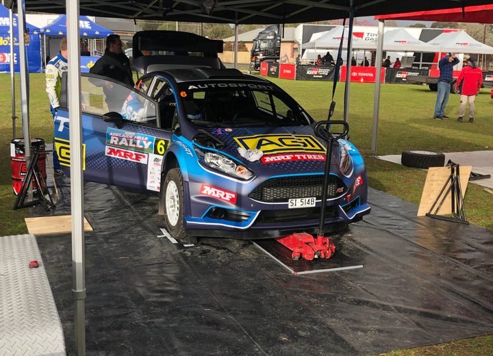 How Custom Pit Mats and Garage Mats Elevate Your Professional Image
